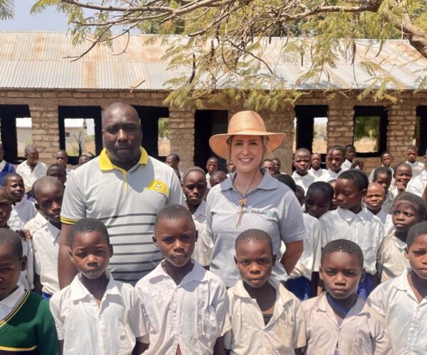 03.10.23 – Continued community engagement work in the region we operate is critical to building strong relationships with the local community.

Below, our HE1 CEO Lorna Blaisse is meeting with Deputy Headteacher and children of Mkonko village Primary School.