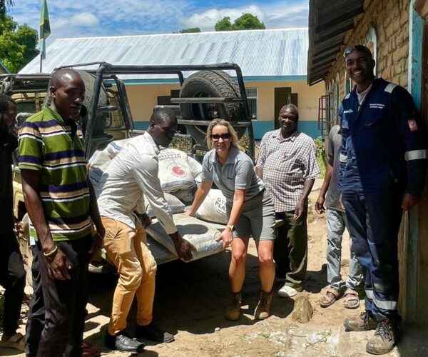 24.01.24 – Our CEO Lorna Blaisse donating building supplies to community members for upgrade work to Mkonko village dispensary